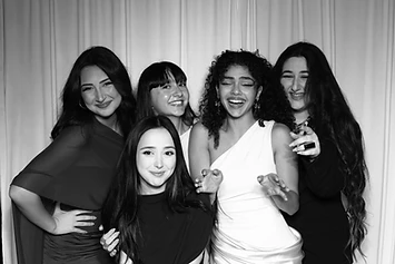 Five women posing together at a GlamBooth wedding