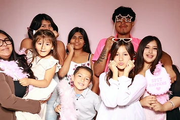 Group celebrating at a GlamBooth baby shower