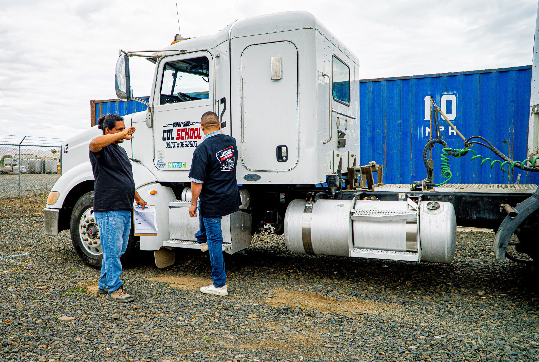 Sunnyside CDL School instructor teaching at the truck