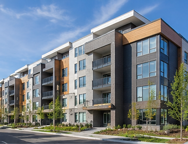Completed modern apartment building exterior under a clear blue sky