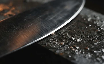 Macro close-up of a professionally sharpened knife edge