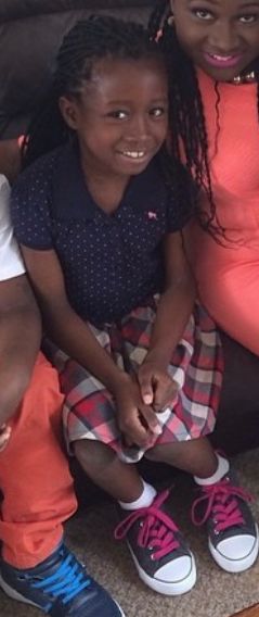 Elizabeth in a collared shirt