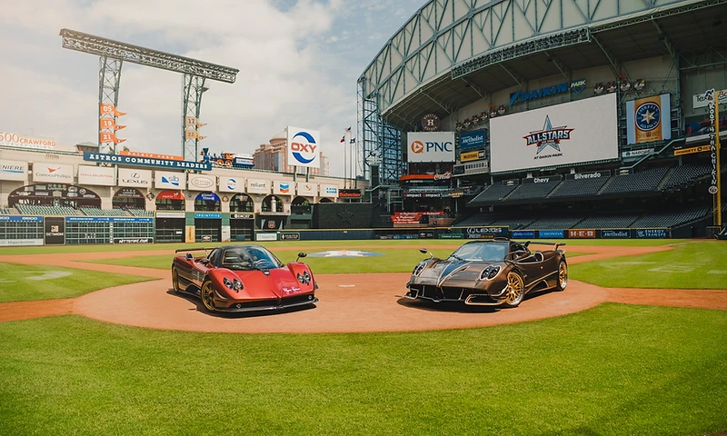 Elite cars arranged at an industrial show venue