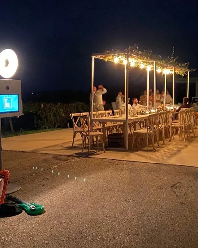 Snapify photobooth lit up at an evening event in Mallorca