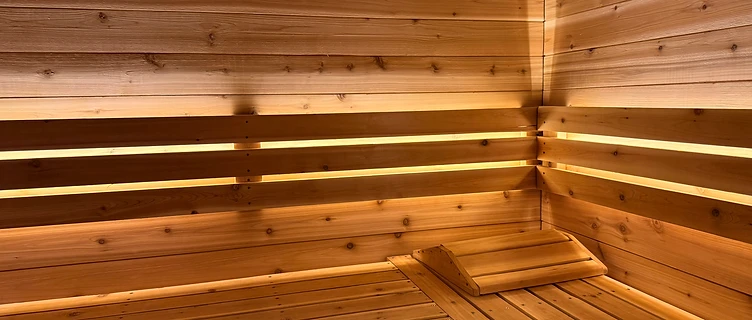 Cedar sauna interior with warm LED lighting
