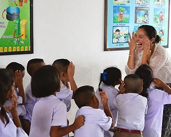 TFT teacher with students in class