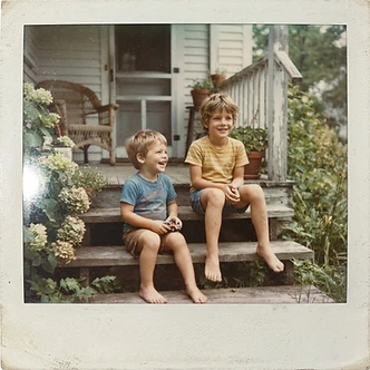 Polaroid-style photograph of two brothers on a porch step