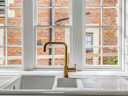 Butler sink with brass tap