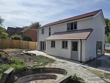 Rear elevation with French doors opening onto the patio