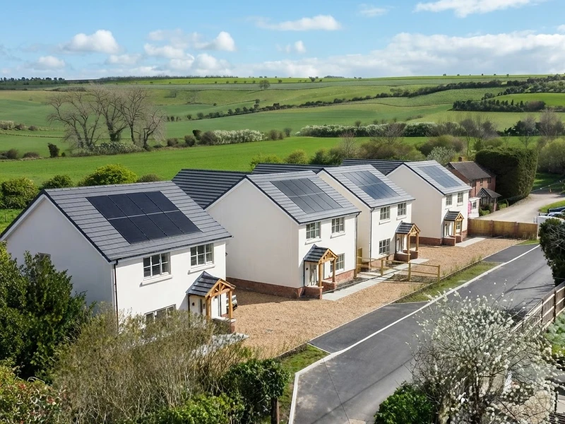 Aerial view of new-build homes in the Wiltshire countryside