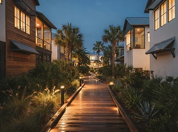 Landscaped walkway with evening lighting