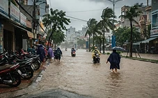 Da Nang flood on a city street during typhoon season with rain and water on the road