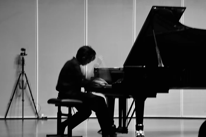 Ho Yu-To performing at the piano