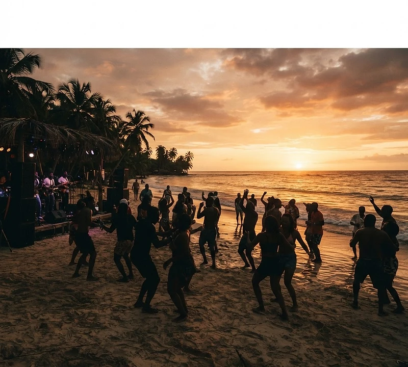 Silhouettes dancing to soca on a Caribbean beach at golden sunset