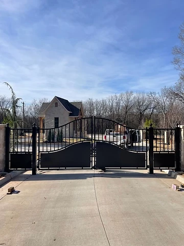 Modern solid-panel driveway gate with minimal contemporary design