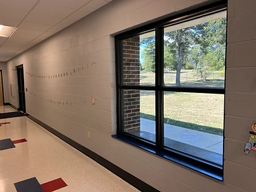 Hallway perspective with window view at Ackerman Elementary Addition