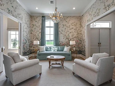Formal living parlor with sofa and arched window