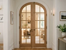 Elegant arched wooden French Doors & Windows interior entryway design installed in a home in Colts Neck, NJ.