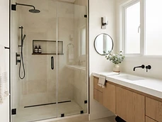 Bathroom interior featuring a walk-in glass shower completed during a Renovation & Remodeling in Deal, NJ.