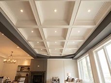 Living room ceiling with detailed coffered woodwork installed by our Residential Carpentry experts in Rumson, NJ.