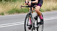 Cyclist in aero position on a road bike