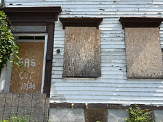 Boarded vacant house purchased by Turnkey Cash Offers