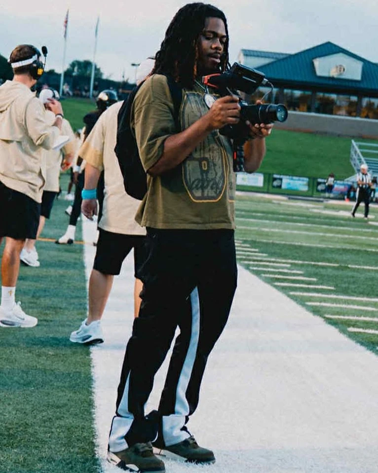 CZN videographer on the field