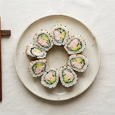 California roll pieces with sesame