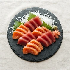 Assorted fresh sashimi on slate
