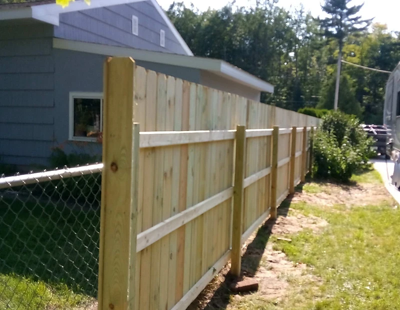Newly built wooden privacy fence by All Aspects in Sault Ste. Marie, Michigan