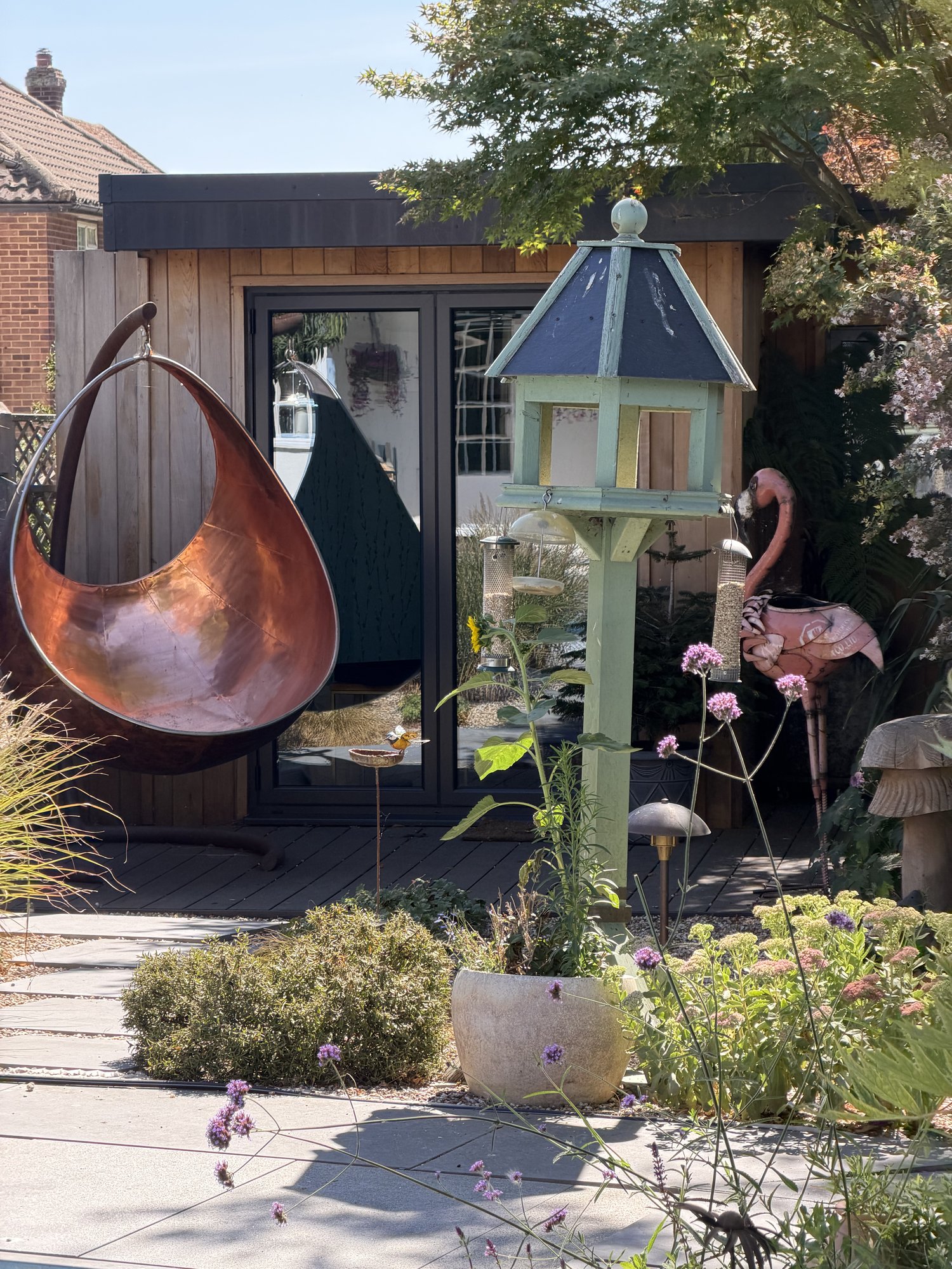 Garden room, flamingo and planting