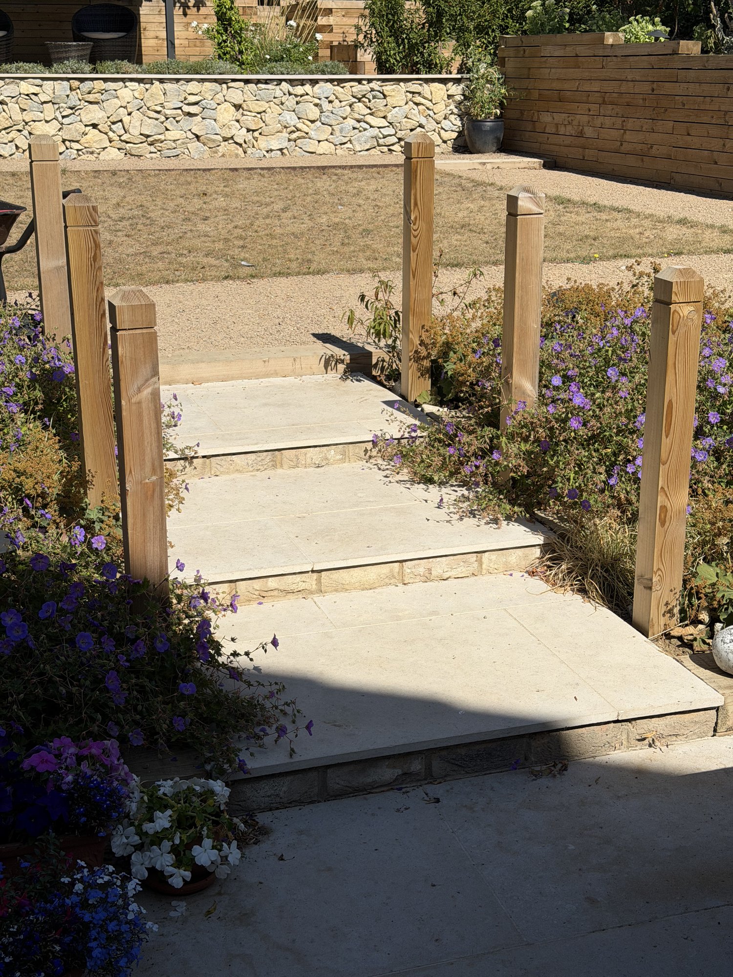 Stone steps flanked by timber posts