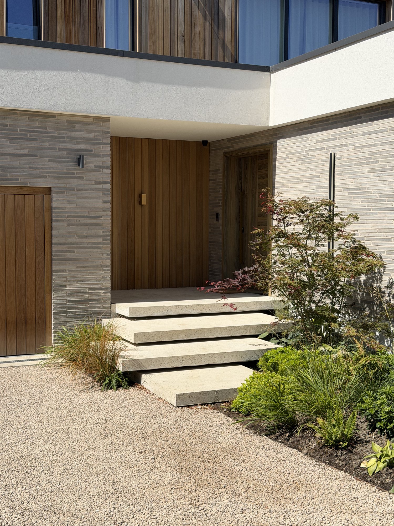 Entrance and floating concrete steps