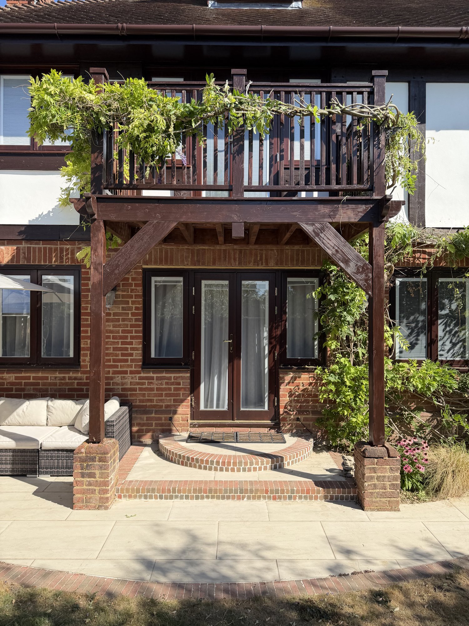 Wisteria-clad balcony and terrace
