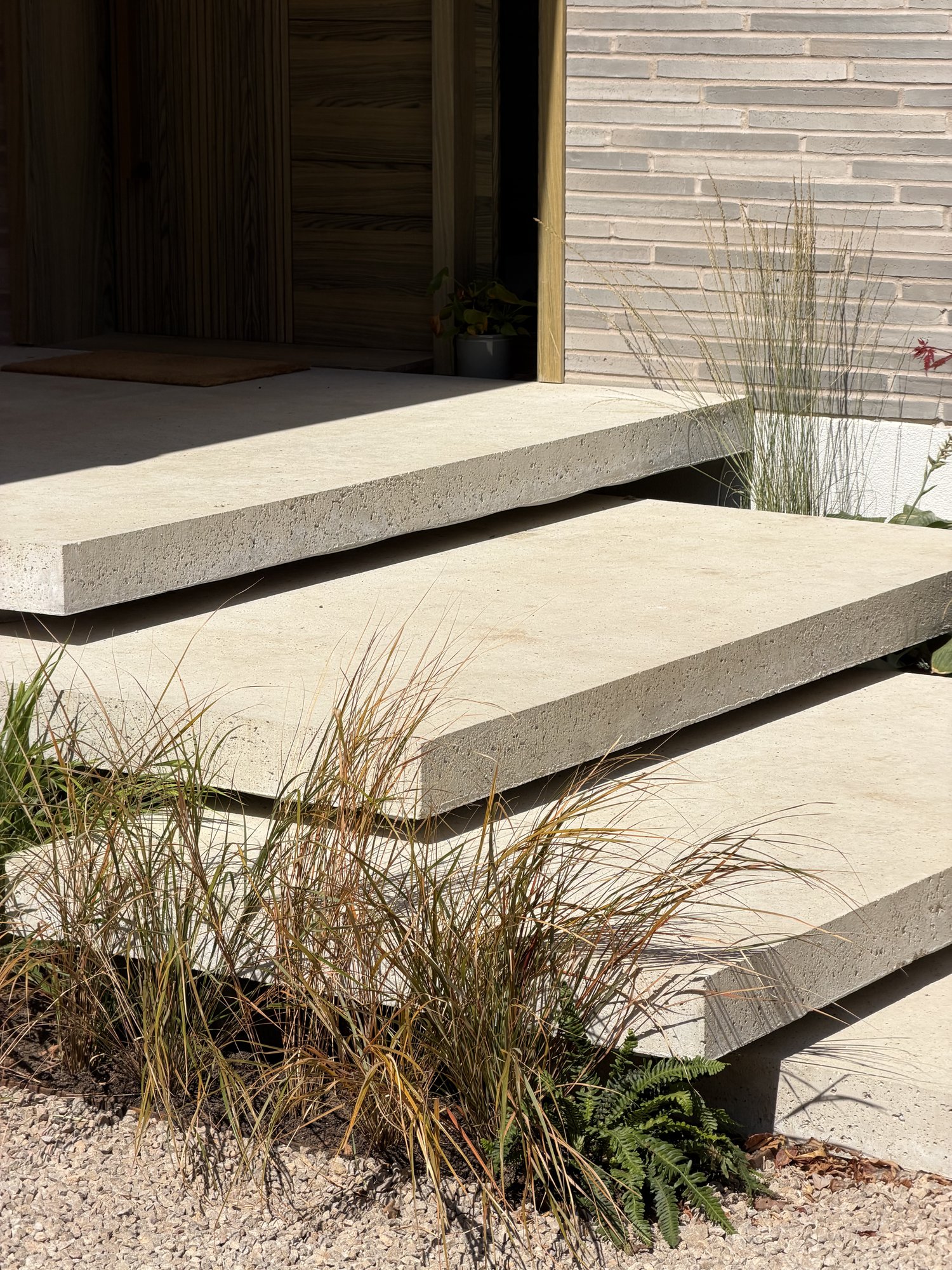 Floating steps against the brick wall