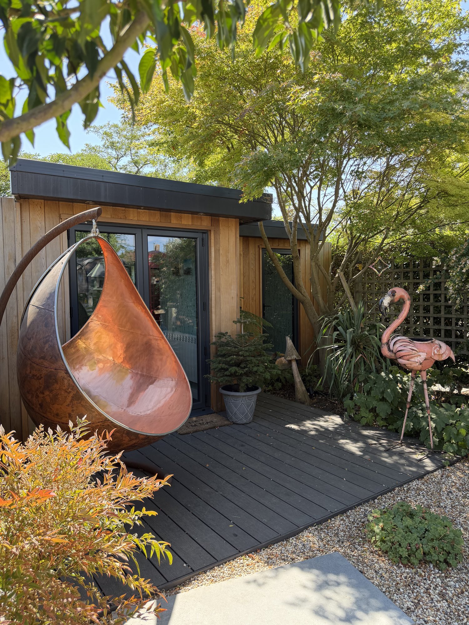 Copper hanging chair on the deck