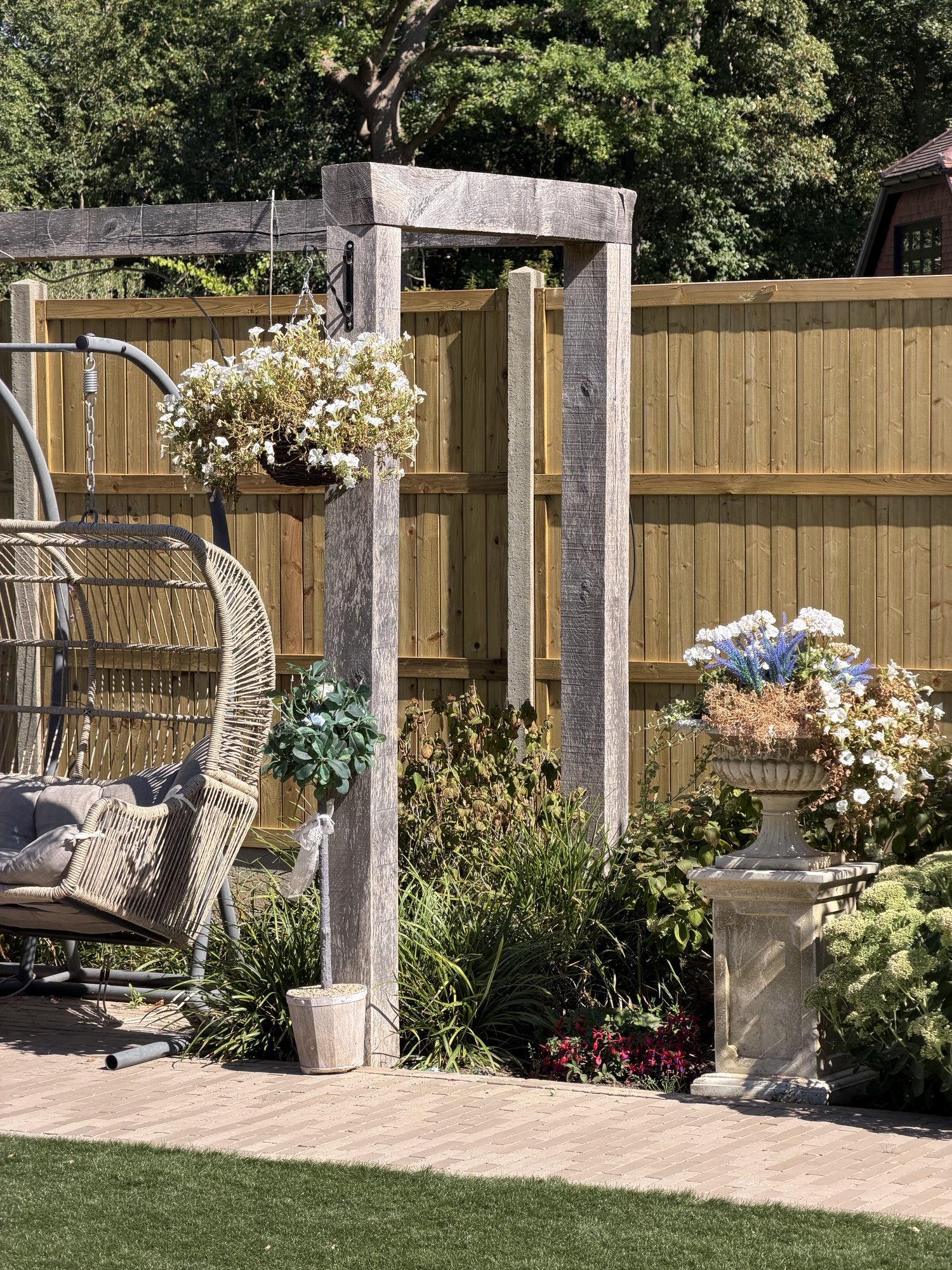 Pergola corner with hanging chair