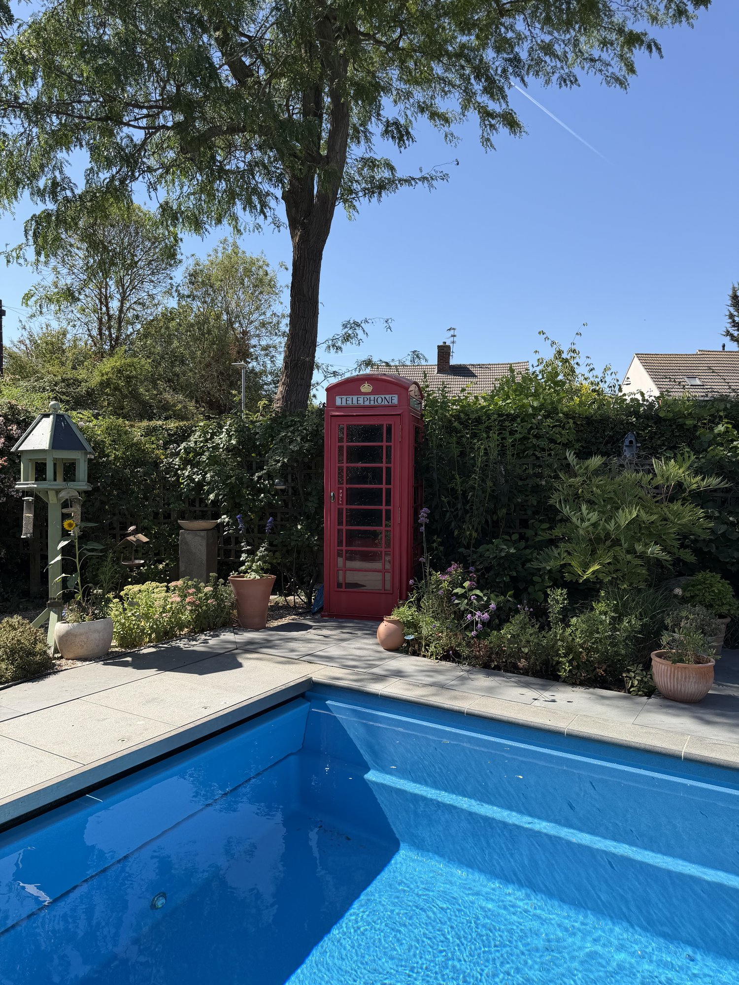 Pool, terrace and the telephone box