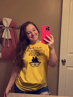 Founder wearing a Mental Health Matters piece