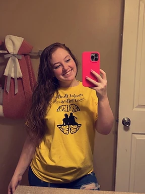 Founder wearing a Mental Health Matters piece