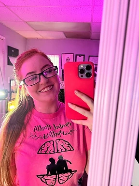 Founder wearing a Mental Health Matters piece