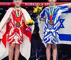 AVT youth boy raises England flag — IMMAF victory
