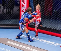 AVT girl raises England flag after winning at Worlds