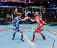 Two AVT youths squaring off in the cage