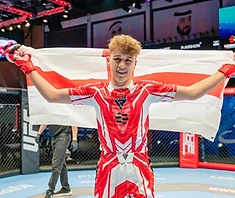 AVT youth holding England flag after victory