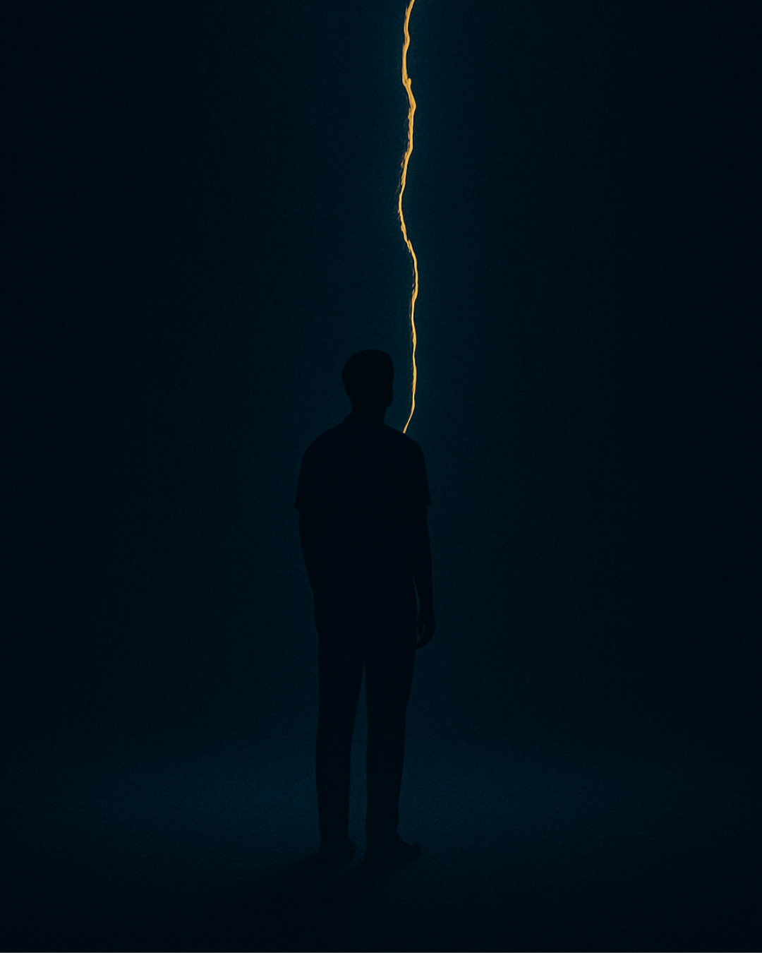 Silhouette with a golden thread of light rising from its head