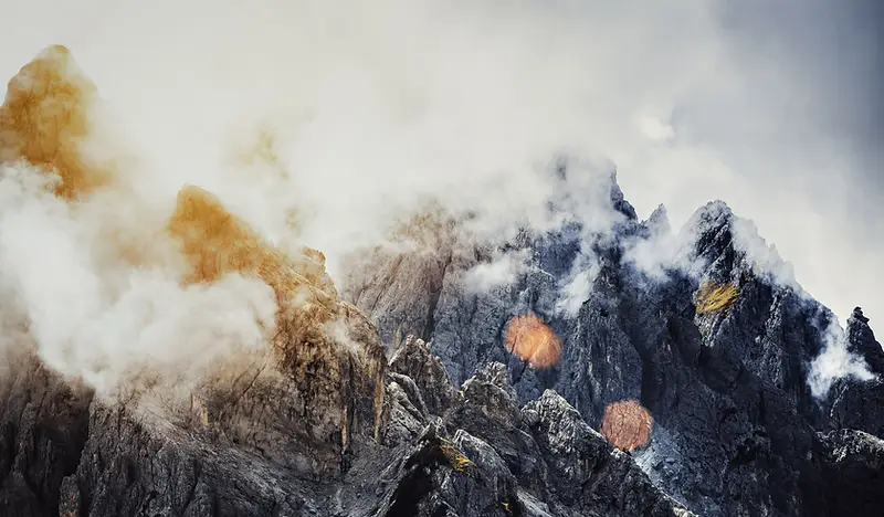 Mountain ridge above the clouds