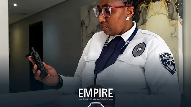 Empire security officer in uniform with radio at a commercial property in Cape Town