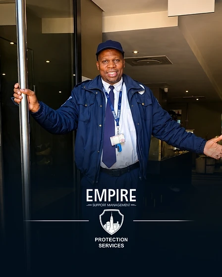Smiling Empire guarding officer in uniform welcoming a visitor at a managed site in Cape Town