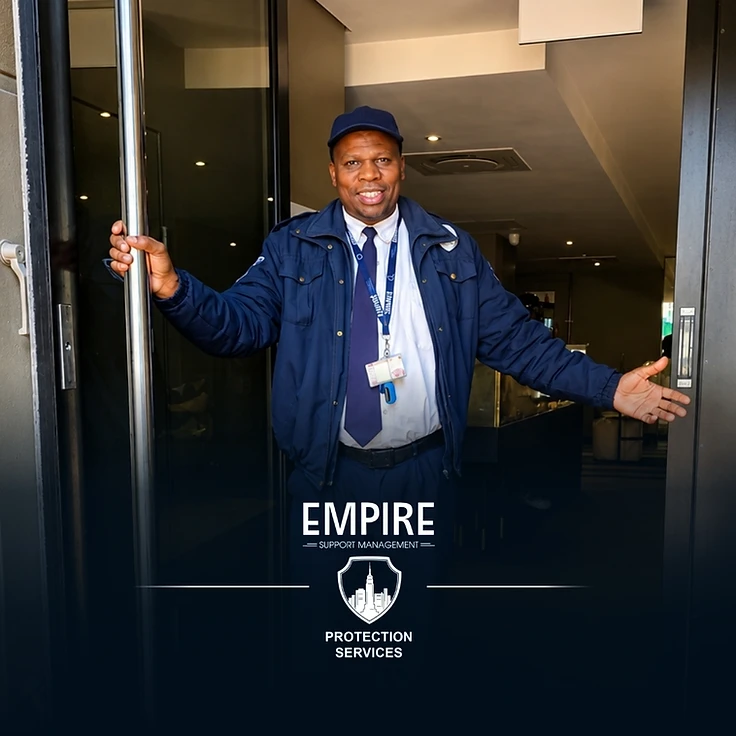 Empire security officer in uniform welcoming visitors at a building entrance in Cape Town